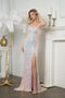Shine bright in this sleeveless sequin slit gown with a shimmering fitted bodice by Juno M1014.