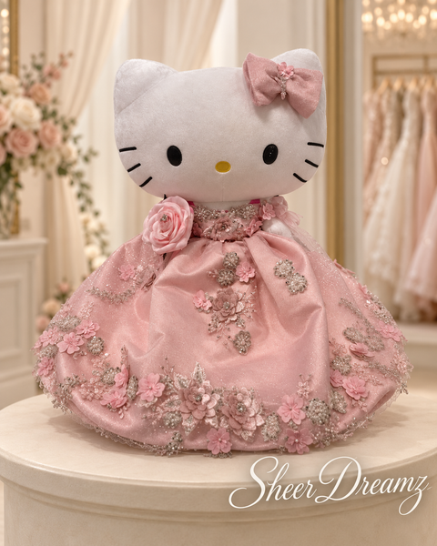 Blush pink Hello Kitty quinceañera doll wearing a handmade floral ball gown