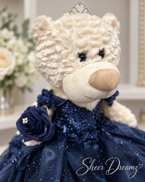 Navy blue Sweet 15 teddy bear with tiara and floral gown close-up