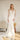Vestido de novia blanco con cola catedral y mangas largas de Nox Anabel JE916
