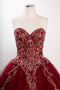 Coya L2726 presents an elegant ball gown with an embroidered strapless cape