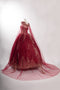 Coya L2726 presents an elegant ball gown with an embroidered strapless cape